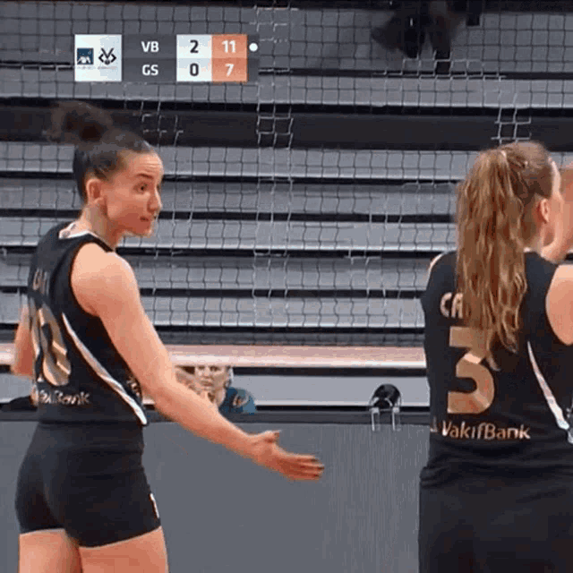 a female volleyball player wearing a number 5 jersey