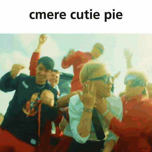 a group of people are dancing with the words cmere cutie pie written above them