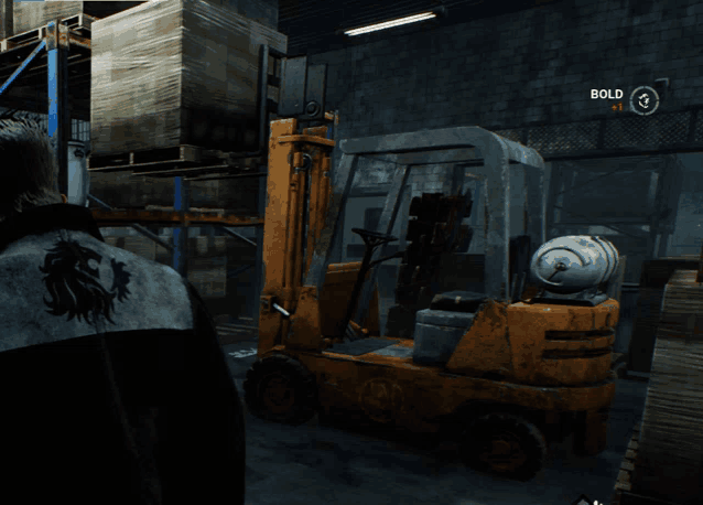 a man stands in front of a forklift in a warehouse with a bold sign above it