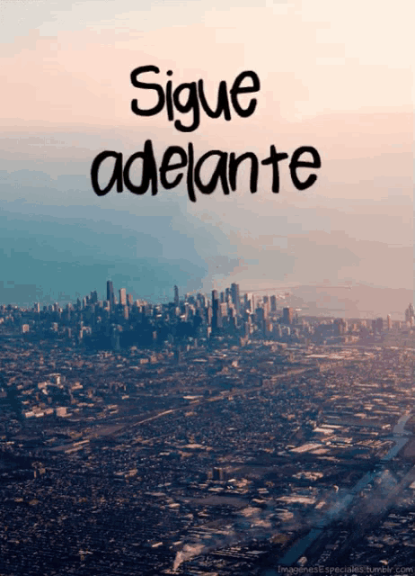 an aerial view of a city and the words sigue adelante