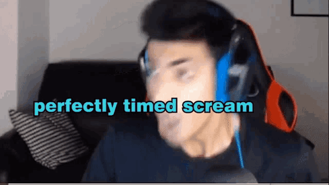 a man wearing headphones with the words " perfectly timed scream " behind him