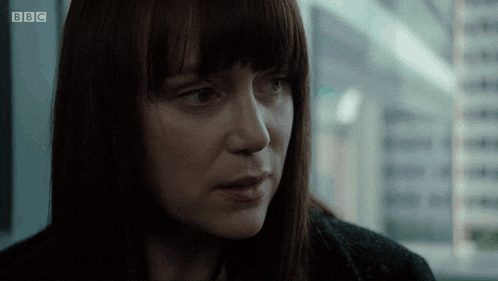 a close up of a woman 's face with bbc written on the bottom right