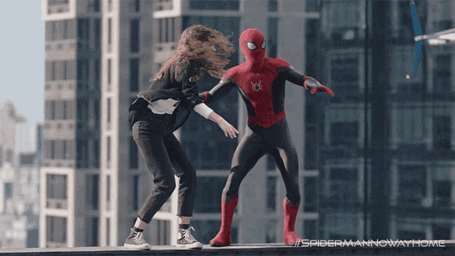 a spider man standing next to a woman on a ledge with the words spiderman now way home below them