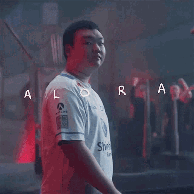 a man wearing a white shirt that says shinhan bank