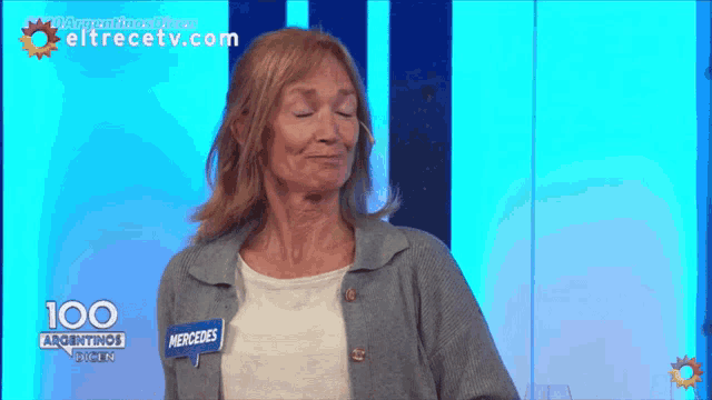 a woman with the name mercedes on her shirt