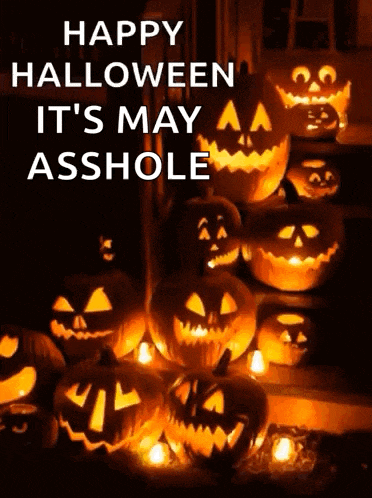 a bunch of pumpkins are lit up with the words happy halloween it 's may asshole written above them
