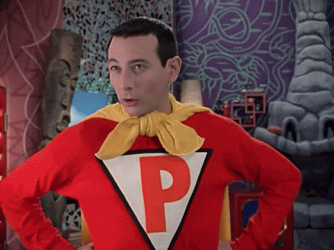 a man in a red superhero costume with the letter p on it