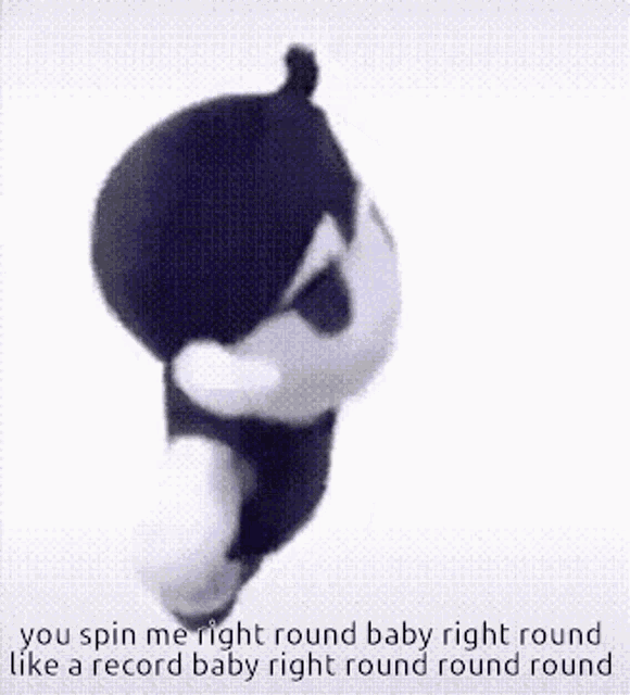 a stuffed animal with the words you spin me right round baby right round like a record baby right round round round .