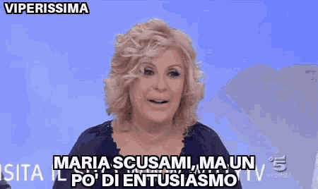 a woman is talking on a tv show and says viperissima maria scusami ma un sito w po di entusiasmo