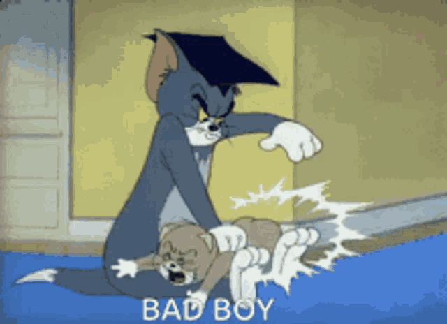 a cartoon of tom and jerry with the words bad boy below them