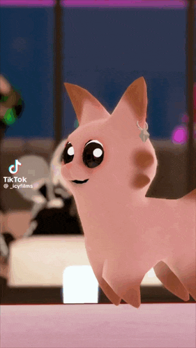 a pink cat with a necklace on its ear is standing on a table in a room .