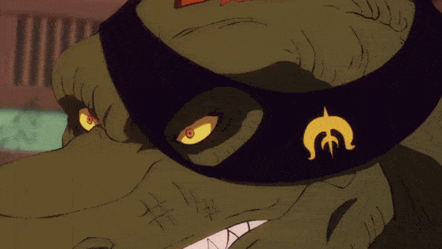 a close up of a cartoon character 's face with red eyes