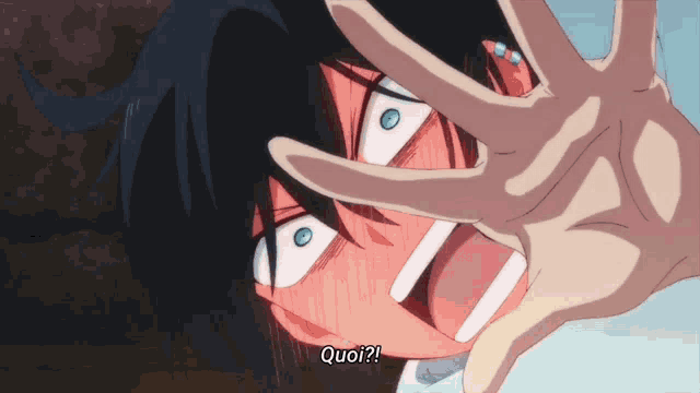 a close up of a person 's face with the word quoi written below it