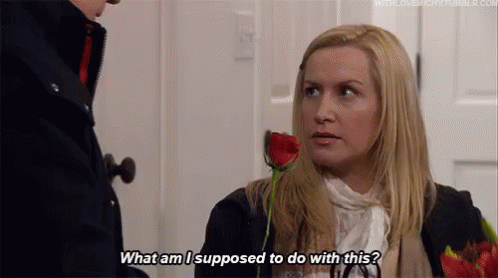 When You Don'T Understand Flirting GIF - What Am I Supposed To Do With This Angela The Office GIFs