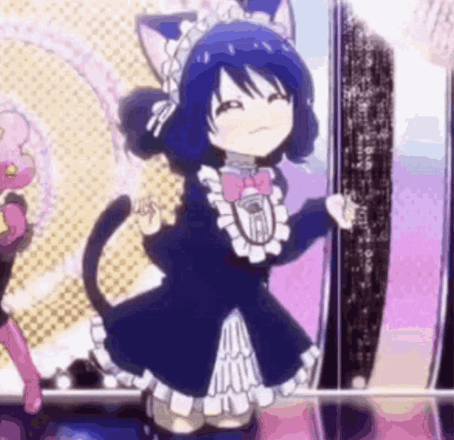 a girl with cat ears and a maid outfit is dancing on a stage .