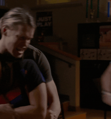 a blurry picture of a man and woman dancing