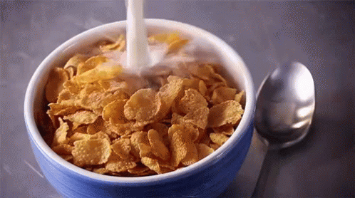 Pouring Milk On Cornflakes GIF - Breakfast Cereal Cornflakes GIFs