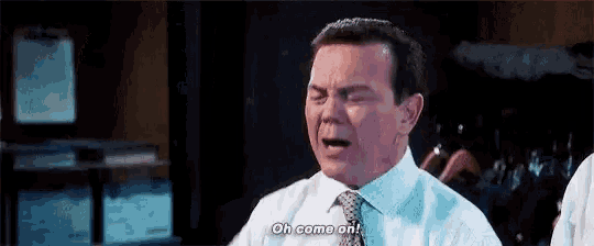 a man in a white shirt and tie is crying and saying `` oh come on ! ''