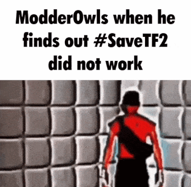 a picture of a man standing in front of a wall that says modderowls when he finds out #savetf2