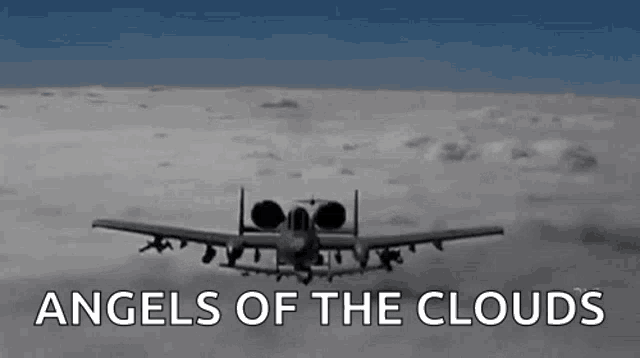 a plane is flying through the clouds with the words `` angels of the clouds '' above it .
