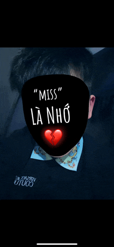 a man 's face is covered by a black mask that says miss la nho