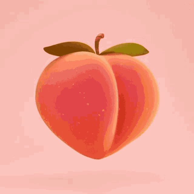 a peach with a green leaf is floating in the air .