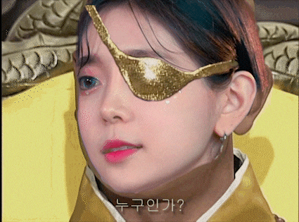 a close up of a woman 's face with korean writing