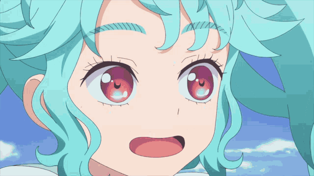 a close up of a girl 's face with a surprised look on her face