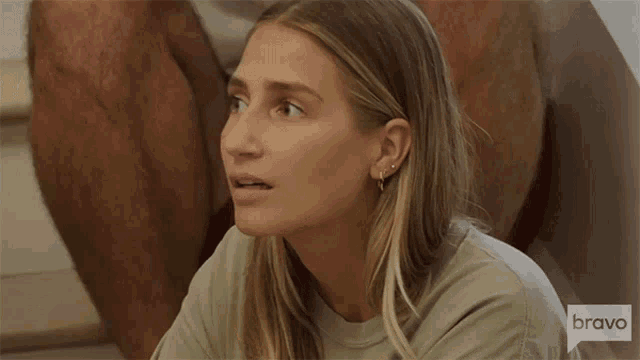 a woman with a surprised look on her face is shown on bravo