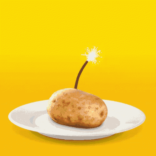 a white plate is surrounded by flames and a yellow background