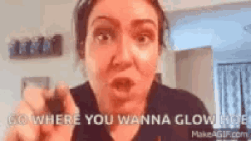 a woman is making a funny face and says `` go where you wanna glow in the dark '' .