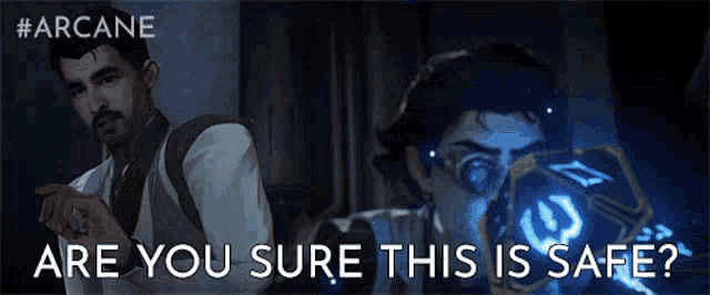 a man in a suit and tie is looking at a cube with the words are you sure this is safe written on it .