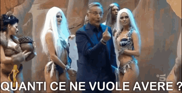 a man stands in front of a group of women with the words quanti ce ne vuole avere written below him