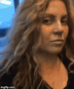 a close up of a woman 's face with the url imgflip.com visible