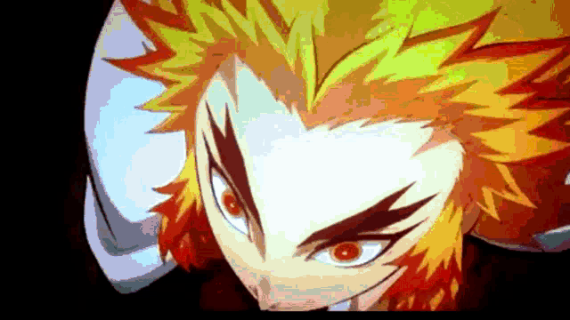 a close up of a cartoon character 's face with orange hair and red eyes