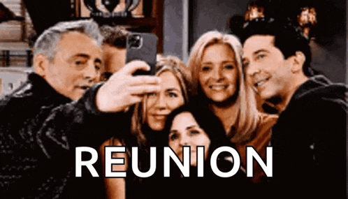 a group of people are taking a selfie with the word reunion in the background .
