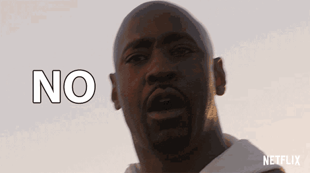 a man 's face is shown with the word no above it