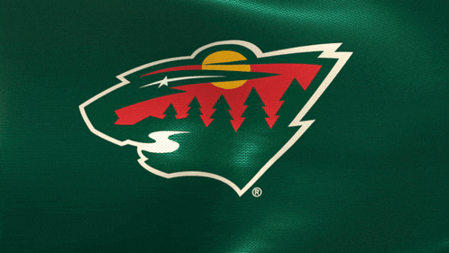 a logo for the minnesota wild with a bear and trees