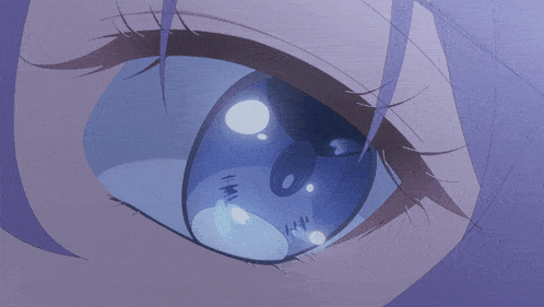 a close up of a girl 's blue eye with a purple background