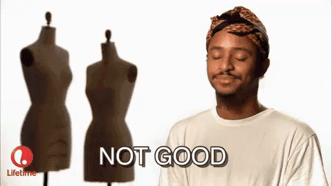 a man wearing a headband and a white shirt is standing in front of three mannequins and saying not good .