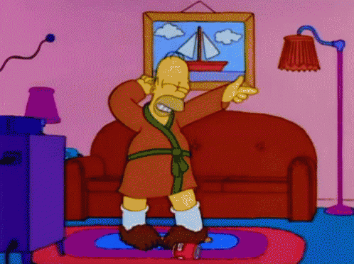 a cartoon of homer simpson dancing in front of a couch