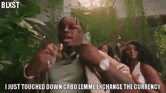 a man is standing in front of a crowd of people and says i just touched down cabo lemme exchange the currency