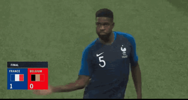 a soccer game is being played between france and belgium and the score is 1 to 0