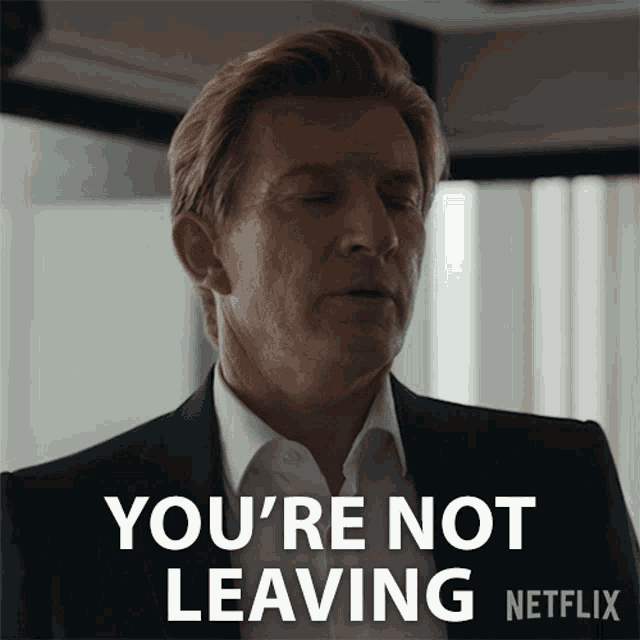 a man in a suit says you 're not leaving