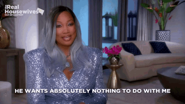 a woman says he wants absolutely nothing to do with me in a living room