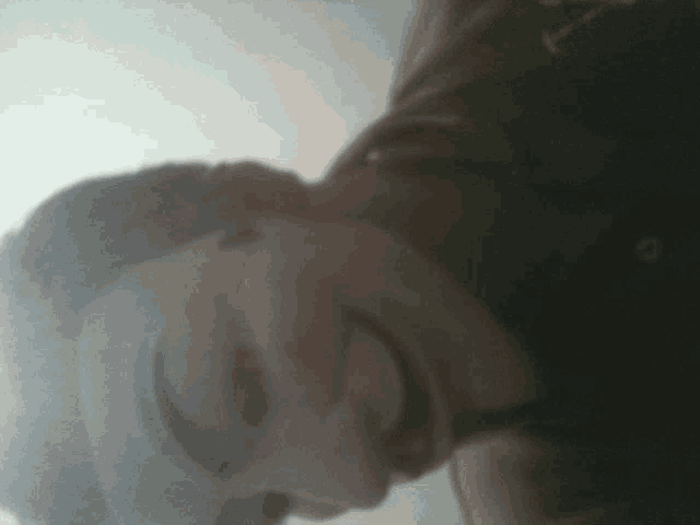 a person wearing a mask that says anonymous on the bottom