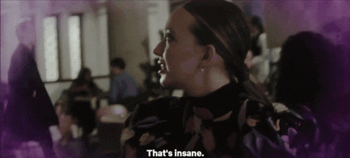 a woman says that 's insane in front of a group of people