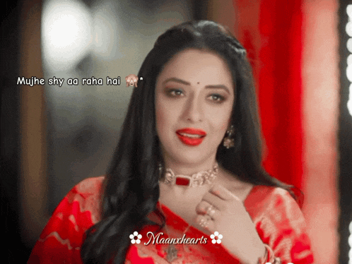 a woman in a red dress with the words " mujhe shy aa raha hai " on the bottom