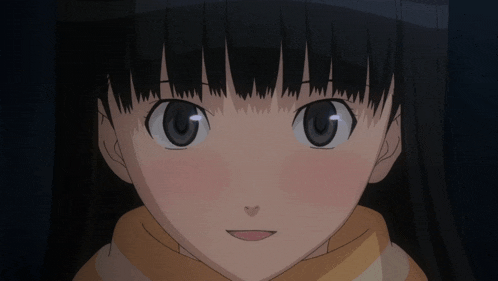 a close up of a girl 's face with a scarf on