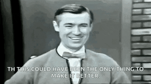 a man in a bow tie is smiling and saying `` this could have been the only thing to make it better . '' .